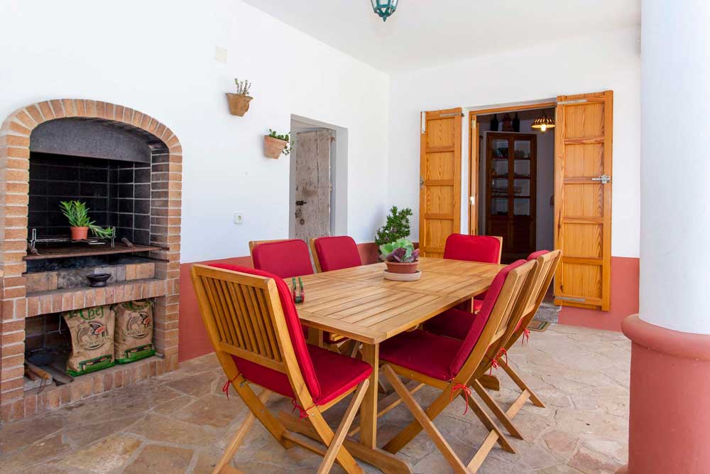 Outside living room with a barbecue zone